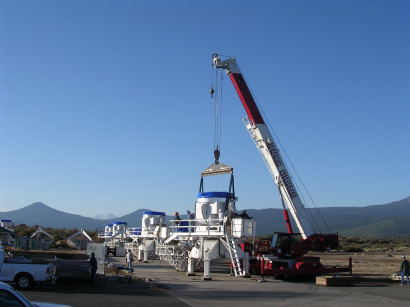 Positioning the crane to pick up the first pedestal.